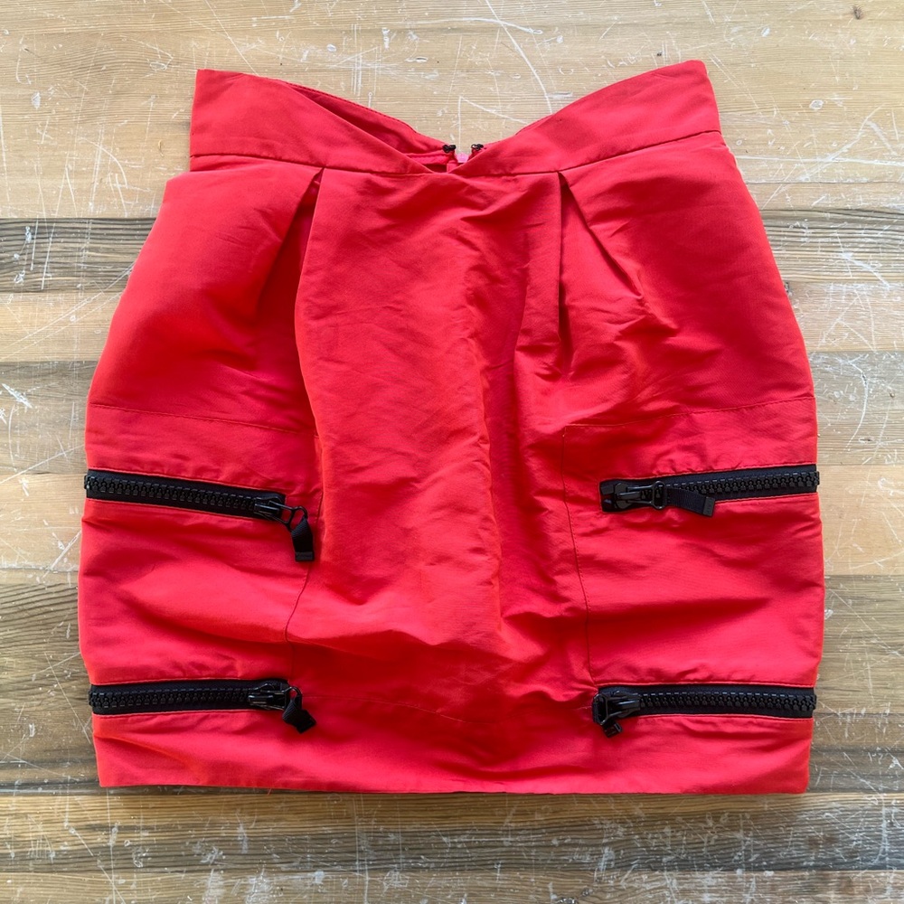 Stylish Red Skirt with Zipper Accents